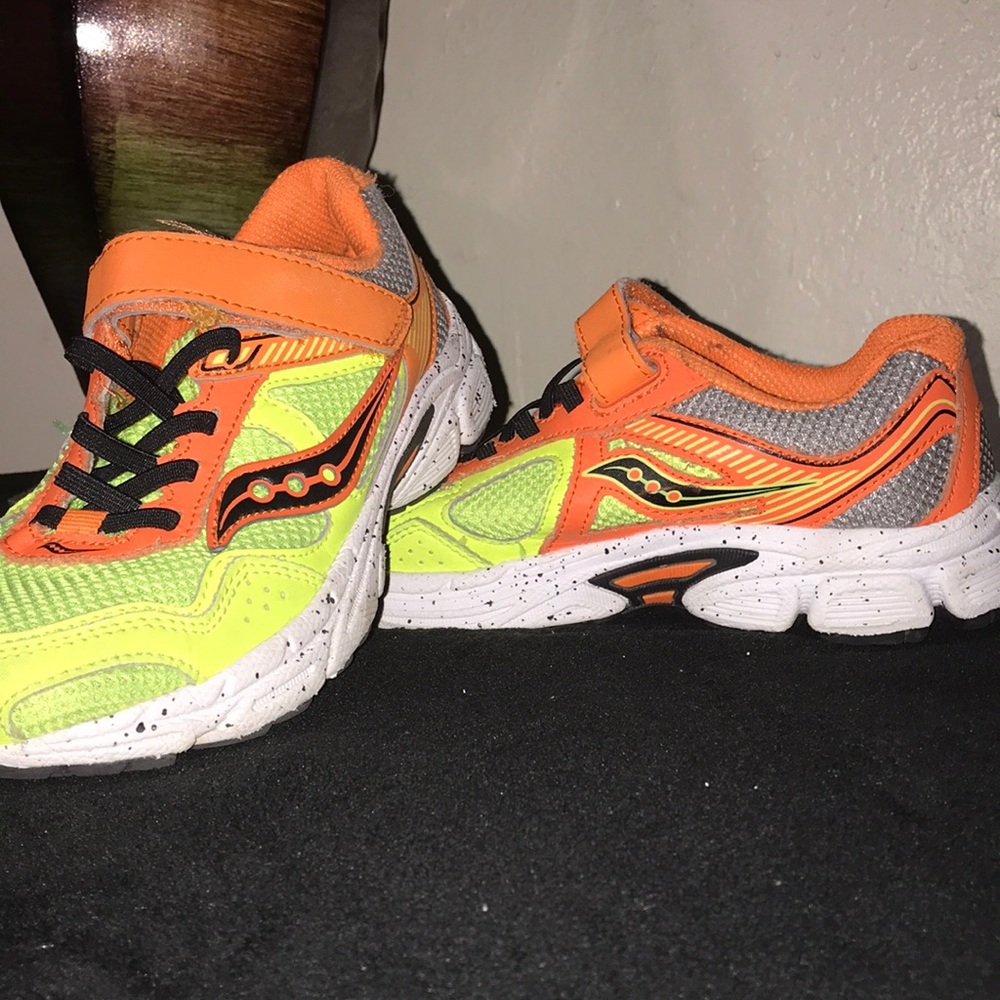 Orange and lime green saucony size 3.5